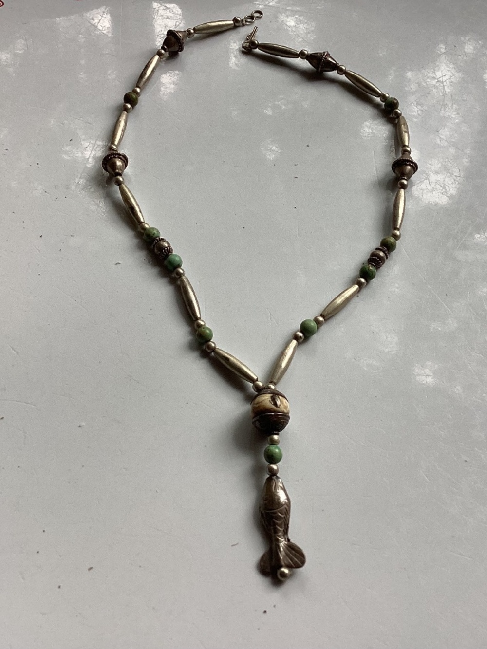 Native American cool bead and fish necklace.